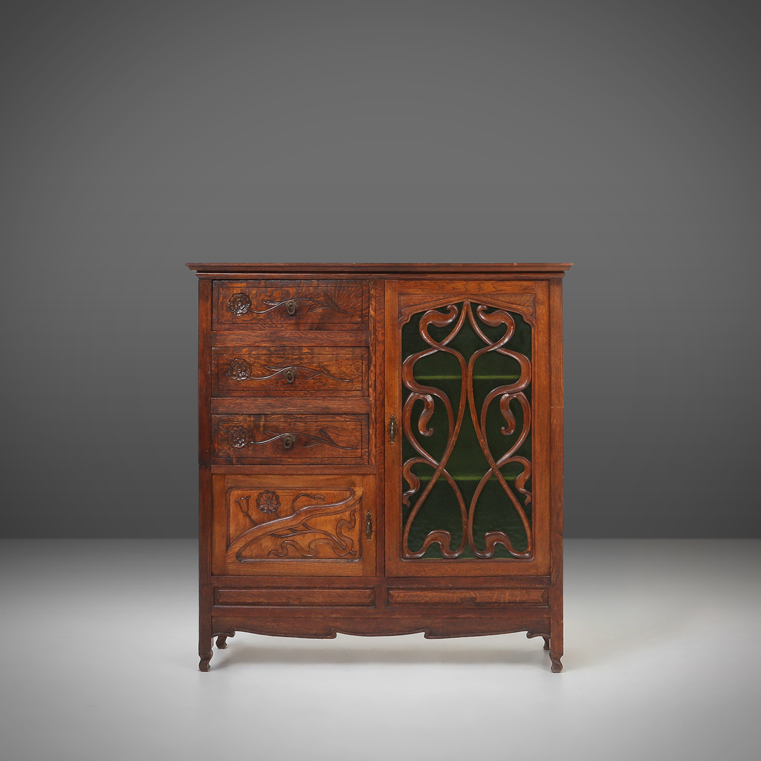 Remarkable Art Nouveau cabinet in oak with green glass, France, 1910thumbnail